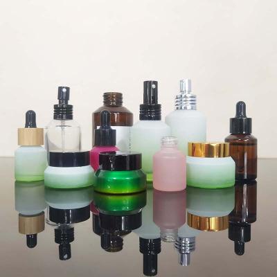 China Viable Personal Care Glass Bottles Essential Oil Cosmetic Black Eco Friendly Packaging for sale