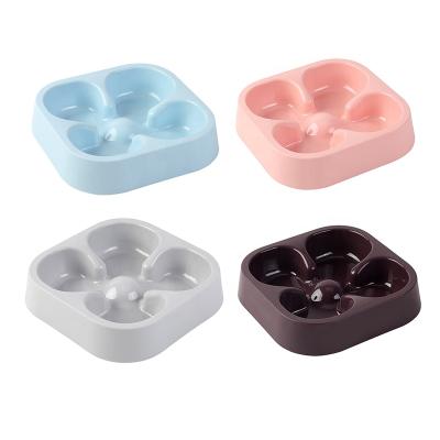 China Sustainable Pet Clog Prevention Bowl Four Leaf Clover Slow Food Bowl For Cats And Dogs for sale