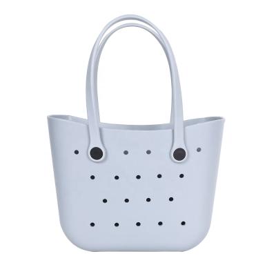 China Hot Sale Fashion Summer Beach Solid Color Silicone Rubber Tote Bag EVA Hollow Beach Bag For Women for sale