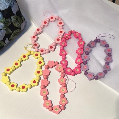 China BOHEMIA Mobile Phone Chain Flower Lanyard INS Color Beaded Cell Phone Case Short Pendant for sale