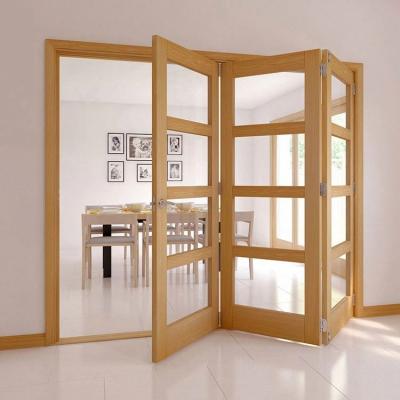 China Sound Insulation American Glossy Modern Red Oak Finish HPL Core Semi-Solid Folding Door For Apartment for sale