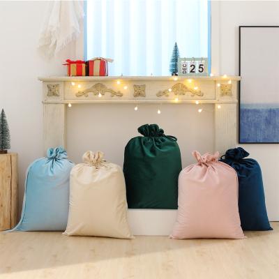 China Customized Christmas Bags Luxury Custom Drawstring Holiday Decoration White Velvet Santa Sack for sale