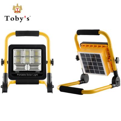 China rechargeable solar floodlight Led camping work light emergency work light foldable solar portable light FB65 for sale