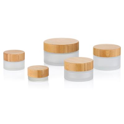 China China Cosmetic Packaging Glass Lid Containers With Bambo Chin 50Ml Bamboo Cosmetic Cream Jar for sale