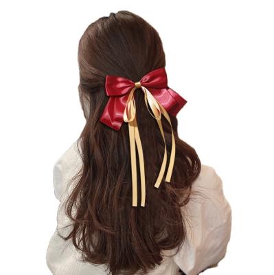 China Sweet Real Hair Clip in Extensions Designer Hair Clips Korea Poinsettia Hair Clip Customize for sale