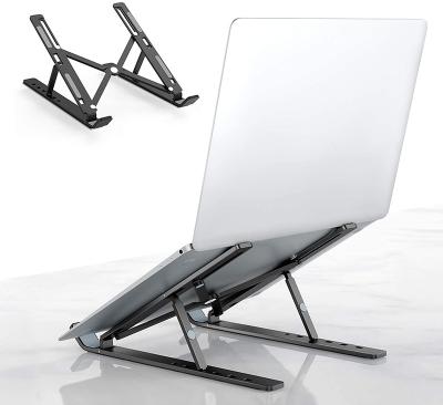 China Creative Plastic Aluminum Alloy Laptop Stand (Size) Adjustable Foldable Quality for sale