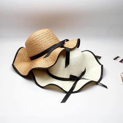 China Big striped eaves beach bow-knot sun hat summer leisure all-match female straw hat for sale