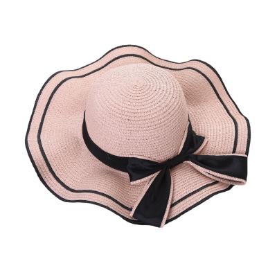 China Hot Sale Design Barred Wavy Bow Outside The Brim Beach Sombrero Papyrus Wide Straw Hats for sale