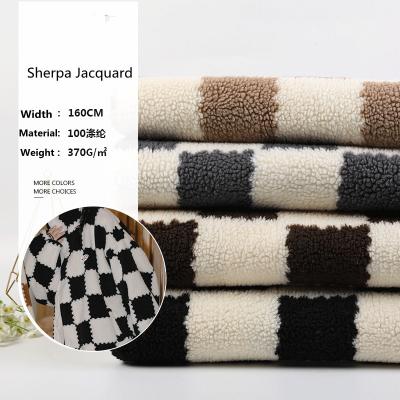 China New Product 100% Shrink-Resistant Biscuit Checker Polyester Jacquard Sherpa Fabric for sale