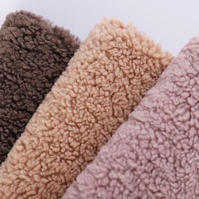 China 100% Shrink-Resistant Polyester Suede Fabric Bonded Hometextile Sherpa Fabric For Clothes Luggage Home Toys for sale