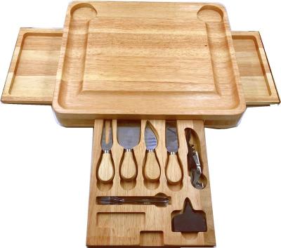 China Sustainable Premium Acacia Wood Cheese Rubber Wood Bamboo Board Set With Hidden Drawer For Cutlery Set Cutting Board Set for sale