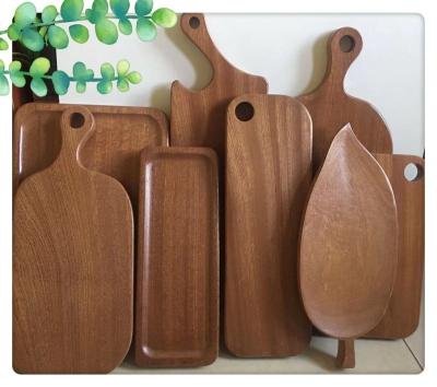 China Sustainable Black Walnut Wooden Cutting Board Wooden Chopper For Kitchen for sale