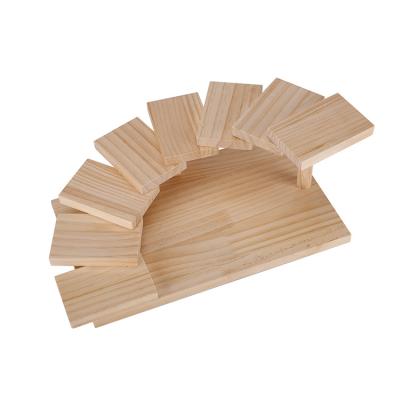 China Viable factory direct sushi veneer wooden spiral Woodenwooden napkin holder rack spiral cake saddle rack for sale