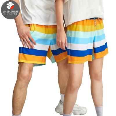 China Custom Unisex Waterproof Boardshorts Water Repellent Stripe Mesh Brief Couple Clothes Summer Digital Printed Casual And Sport Beach Shorts for sale