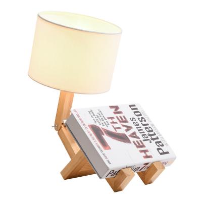 China Modern Wooden Table Lamp Robot Style New Folding For Bedroom Bedside Lamp Shade Cloth Table Lamp for sale