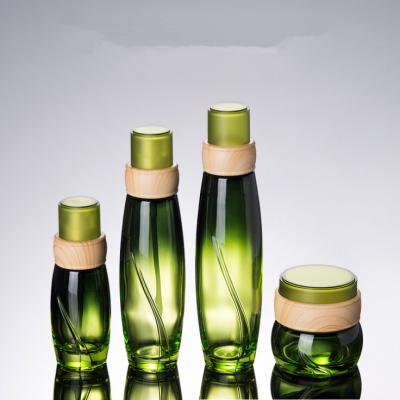 China Best Green Beverage Cosmetics Set Glass Bottles Glass Toner Bottle Cosmetic Glass Cream Jars for sale