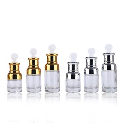 China Hot Selling Personal Care Essential Oil Bottle Packaging Gold Dropper Bottles Glass Dropper Cosmetic Bottles for sale