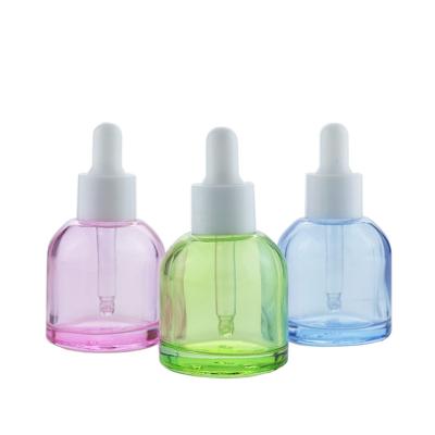 China Custom Glass Bottle 1oz 30ml New Color Recyclable Eco-friendly Essential Oil Glass Dropper Bottles Cosmetic Packaging for sale