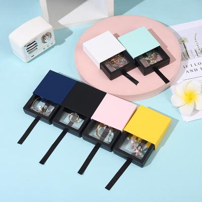 China Custom Jewelry Storge Box 3D Transparent Logo PE film hanging gift packaging bracelet drawer jewelry box for sale