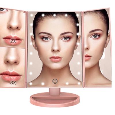 China Lighted Three Way Folding Tabletop White Adjustable Led Mirror 3X Magnifying Makeup Mirror for sale