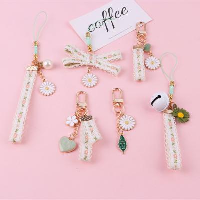 China Wholesale Fashion Trendy Daisy Key Holder Mobile Phone Daisy Lanyard Bag Keychain for Women and Girls for sale