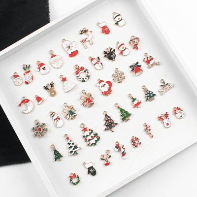 China 38 Pcs TRENDY Christmas Charm Enamel Santa Snowman Bell Elk Snowflake Charm for DIY Jewelry Making for sale