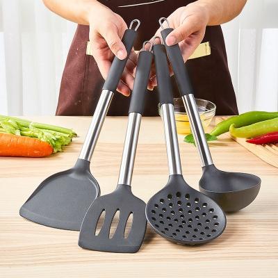 China Sustainable Luxury Silicone Kitchen Utensils Spoons Non Stick Spatula Cookware Set Turner Pocket Slotted Spatula Spoon for sale