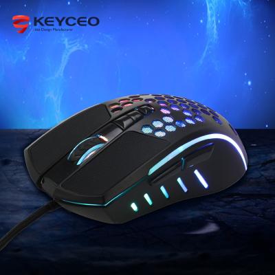 China Hot Selling Wholesale 3D Color Changing Ergonomic LED Backlight Honeycomb Shell Cable Light RGB Ultralight Gamer Mouse for sale