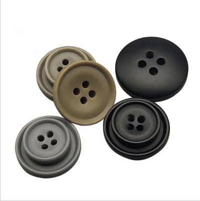 China Sustainable Plastic Buttons Wholesales Normal Colored 4 Holes Sewing Thin E Edge Resin Garment Shirt Coat Sweater 4 Holes Button Custom Made for sale