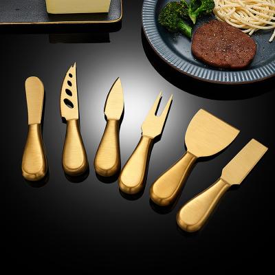 China Durable Stainless Steel Hollow Handle Cheese Knife Set Four Piece Pizza Knife Cheese Kitchen Cooking Tools for sale