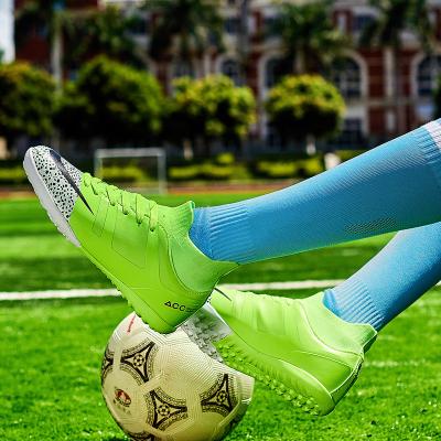 China Fashion trend boy ankle soccer shoes custom high outdoor soccer boots for men futsal cleats for artificial turf soccer shoes for sale