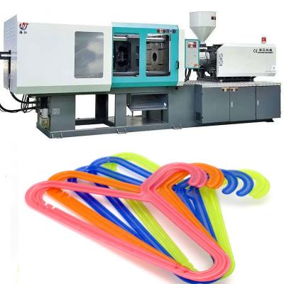 中国 Injection Capacity 1026g Auto Injection Molding Machine with Advanced Safety System Clothes hange Injection Machiner 販売のため