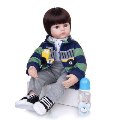 China Toy Keiumi Wholesale Cute Lifelike Soft Cloth Body 24 Inch Soft Silicone Reborn Baby Dolls for sale