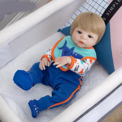 China Realistic Baby Toy Newborn Doll Realistic 57cm Full Silicone Baby Boy Doll Look Reborn Soft Vinyl Christmas Present Toy For Kid Playmate Gift for sale