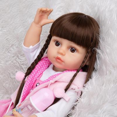 China Soft Toy Reborn Christmas Gift Cute Long Hair 55 cm Bebe Toys Doll Kids Birthday Toddler Boneca Bath Doll 22 Inch Full Silicone KEIUMI for sale