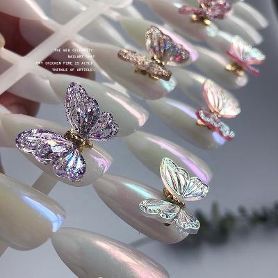 China 2021 New Finger Nail Beauty 8 Colors Nail Ornament Shining The Smart Aurora 3D Resin Butterfly Nail Accessories for sale