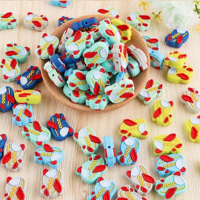 China Toy Mini Cartoon Aircraft Silicone Beads Food Grade Soft Silicone Teethers For Pacifier Clip Baby Accessories for sale