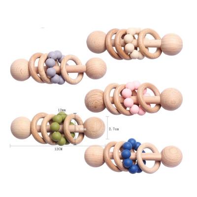 China Toy Wooden Rattle Baby Soft Toy Grasping Rattle Wooden Educational Toy Silicone Sensory Play for sale