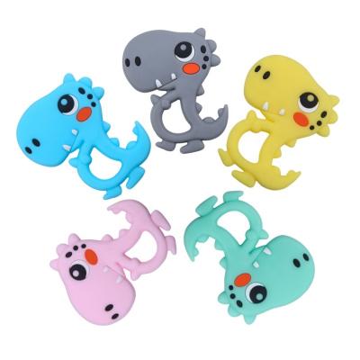 China Toy Silicone Dinosaur Teether Baby Soft Teething Ring Rodent Molar Toy Pacifier Chain Props BPA Free for sale