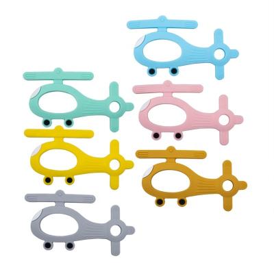 China Toy Silicone Teether Airplane Cartoon Soft Form Food Grade BPA Free Milk Teeth Care Teething Ring Molar Toy for sale