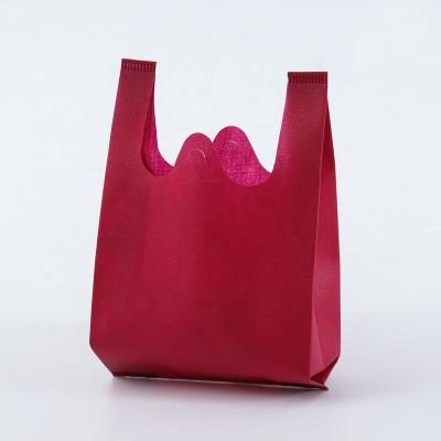 Chine 100% Eco-Friendly Custom Reusable Non Woven Vest Bags W Cut Non Woven T Shirt Shopping Bag à vendre