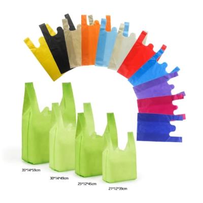 Κίνα 100% Eco-friendly Non Woven Shopping Vest Tote Bags PP Nonwoven T-shirt Handle T-shirt Plastic Bags προς πώληση