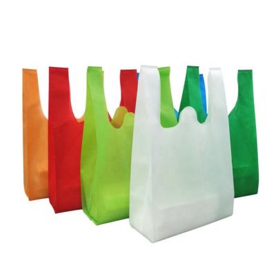 Cina 100% Wholesale Promotional Eco-Friendly Reusable Reusable Eco Friendly T-shirt Grocery Tote Gift Carry pp Nonwoven Shopping Bags With Handle in vendita