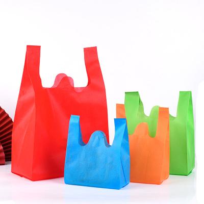 中国 100% Eco-friendly Reusable Foldable Shopping Bags Tote Bag Foldable Nonwoven Vests PP Bag With Handle Food Packaging 販売のため