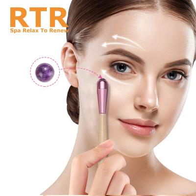 China Portable Wholesale Useful Pink Eye Bag Tightening Ball Eye Lifting Fairy Beauty Stick Face Jade Stone Roller Massage For Girls for sale