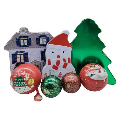 China Recyclable Christmas Gift Tin Box In The Tree Snowman Ball House Shape Christmas Series Metal Tin Box 2021 for sale