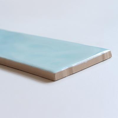 China Modern 75*300mm TV Background Wall Tile Wave Edge Ceramic Heat Insulated ANTI-SLIP Modern Interior Tiles Duck Egg Blue Glazed Tiles for sale