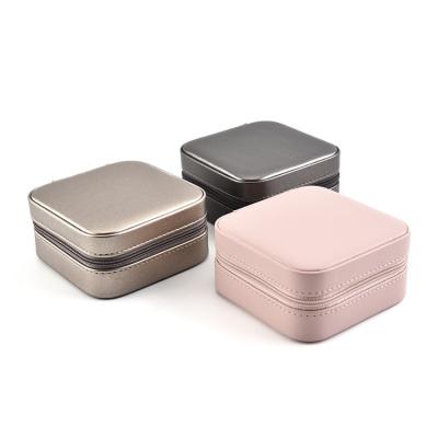 China Custom European PU Leather Jewelry Ring Earring Travel Small Jewelry Boxed Storage Portable Case With Zipper for sale