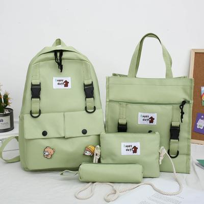 China Factory wholesale fresh small four-piece college student anti-theft girls school bags teen kids backpack set for sale