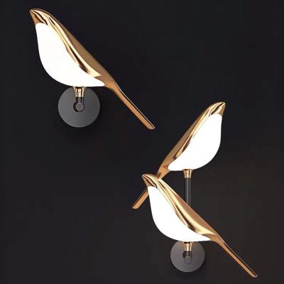 China Modern simple modern magpie wall lamp living room TV background wall led desk lamp bedroom hotel bedside lamp for sale